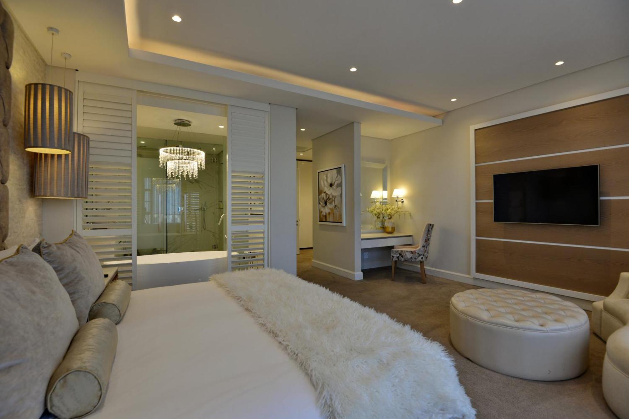 The Houghton Hotel, Spa, Wellness & Golf Johannesburg Pokoj fotografie A bedroom at The Ivy Hotel