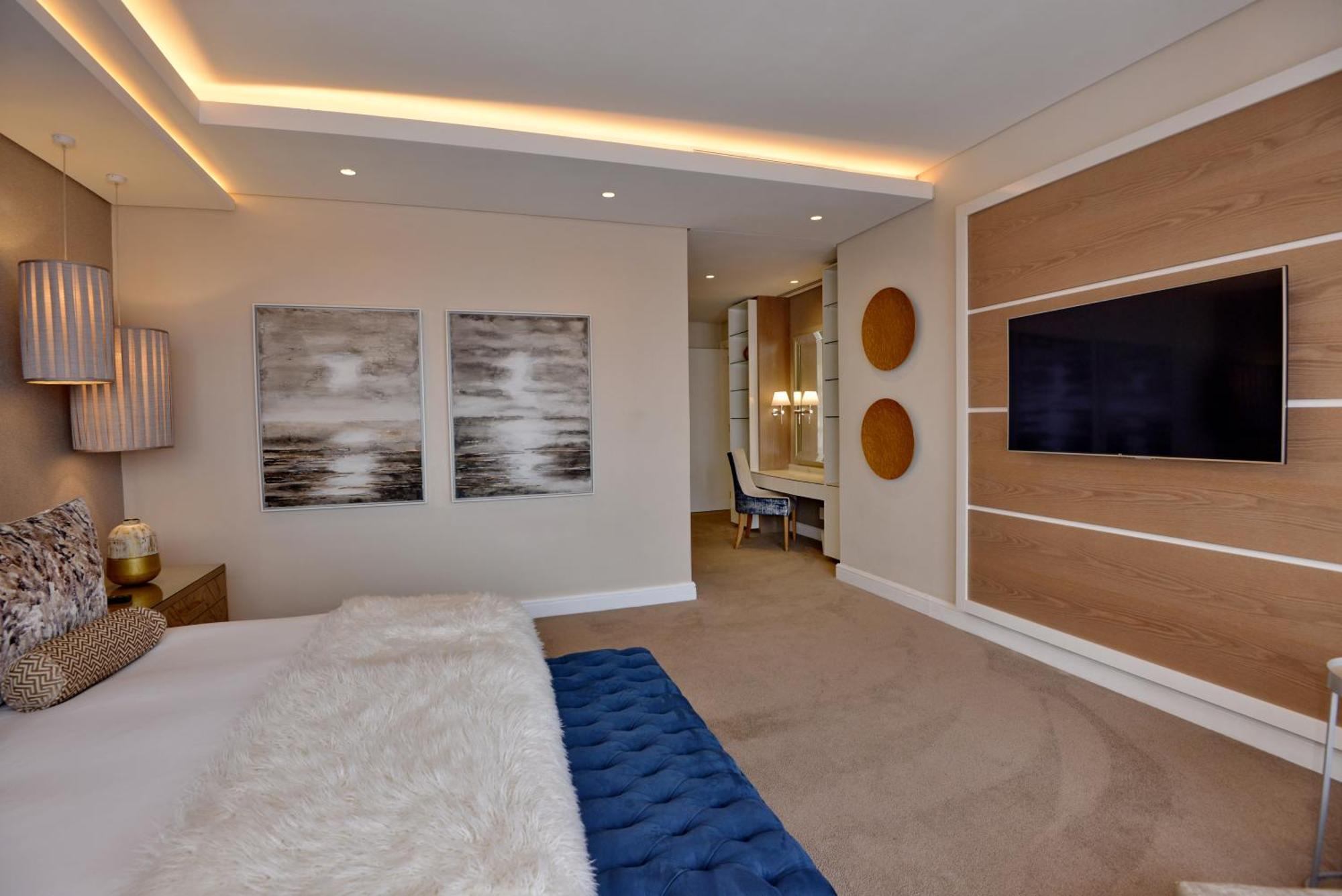 The Houghton Hotel, Spa, Wellness & Golf Johannesburg Pokoj fotografie A bedroom at The Ivy Collection